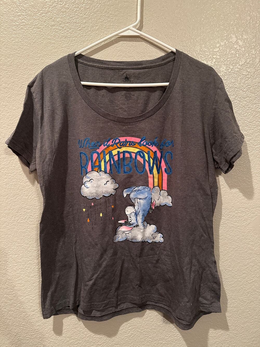 NWOT Disney Parks Eeyore When it Rains, Look for Rainbows Scoop Neck Tee XL